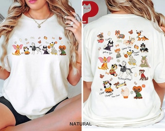 May include: A natural-colored t-shirt featuring a front graphic of various cartoon animals in Halloween costumes and a back graphic with a larger collection of the same characters, including text that reads "No Tricks Just Treats".