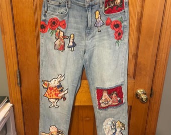 Upcycled Alice in Wonderland Jeans | Handcrafted Storybook Denim | Queen of Hearts, White Rabbit & Cheshire Cat | One-of-a-Kind Wearable Art