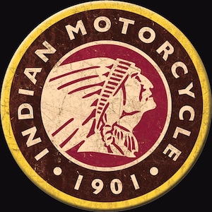 May include: A vintage-style round logo for Indian Motorcycle. The logo features a red profile of an American Indian wearing a feathered headdress. The words "Indian Motorcycle" are written in a circle around the profile, and the year "1901" is written below the profile.