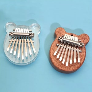 Mini Kalimba Thumb Piano Musical Instrument. 8 Key Instrument for kids and family.