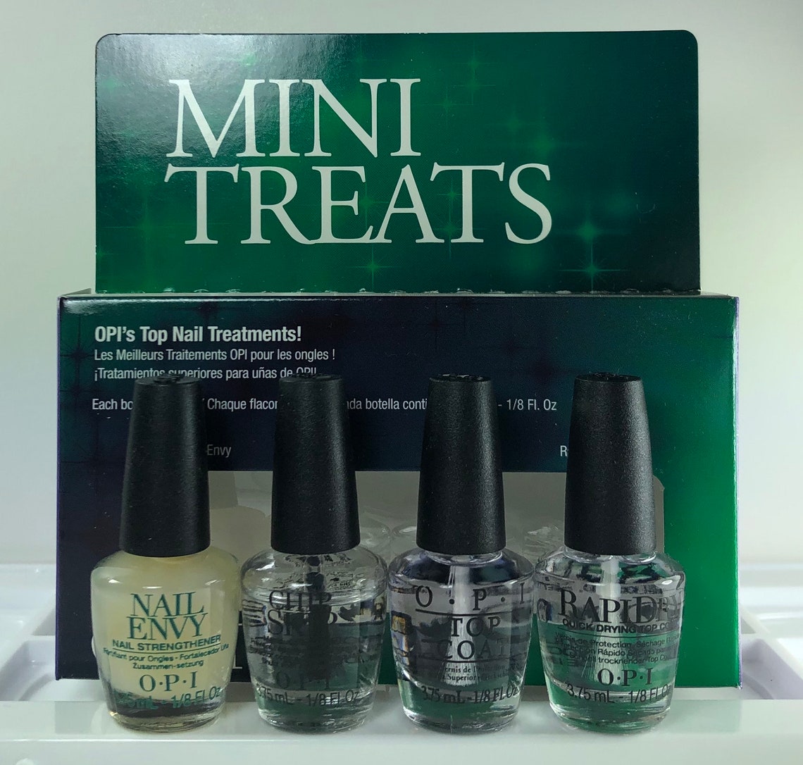 OPI Mini Treats Include 4 Mini Bottles Nail Envy Original Chip Skip Top