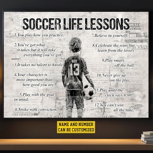 May include: A black and white motivational poster featuring a young football player in the centre. The poster lists 12 football life lessons, including "You play how you practice", "Believe in yourself", and "Play smart off the ball". The poster also includes the text "NAME AND NUMBER CAN BE CUSTOMIZED".