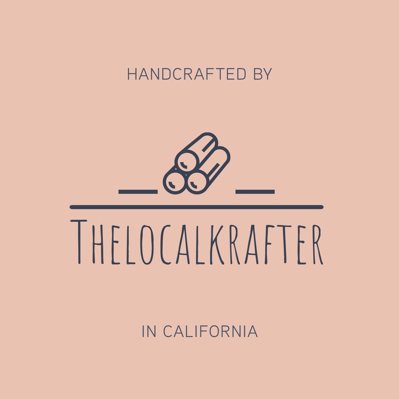 May include: A logo on a peach background features the text "HANDCRAFTED BY" above a graphic of three logs. Below the logs is the text "THELOCALKRAFTER" and "IN CALIFORNIA". The logo is in a dark blue color.