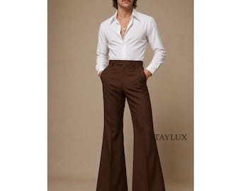 May include: A long-sleeve white button-down shirt with a pointed collar and dark brown high-waisted flared trousers. The shirt is tucked into the pants. The text TAYLUX appears in the upper left, upper right, and lower right corners, with TX in the bottom right.