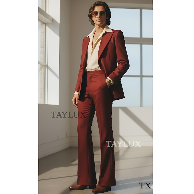 May include: A burgundy suit with a matching blazer and flared pants. The suit is paired with a cream-colored collared shirt and brown shoes. The image includes the text "TAYLUX" and "TX".
