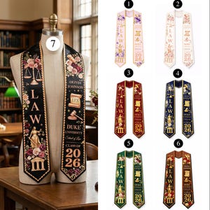 May include: Graduation stoles with LAW and Duke University School of Law details. The stoles are black, burgundy, navy, green, and pink, with floral and gold accents. Each stole has the year 2026.
