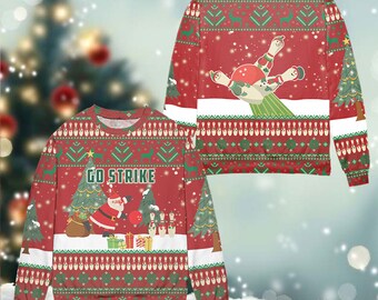 May include: Red Christmas sweater with a green and white pattern. The sweater features a Santa Claus bowling a red ball at bowling pins shaped like snowmen. The text "GO STRIKE" is printed on the sweater.