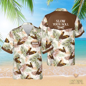 May include: A white and brown Hawaiian shirt with a tropical leaf and cigar pattern. The back of the shirt has the text "Slow Your Roll" with a crossed cigar design. The front of the shirt has the text "Your Name" on a white tag.