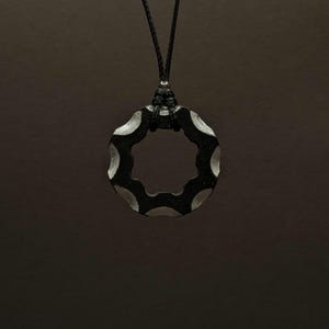 Carved ebony wood and 24K gold leaf necklace – Oculus