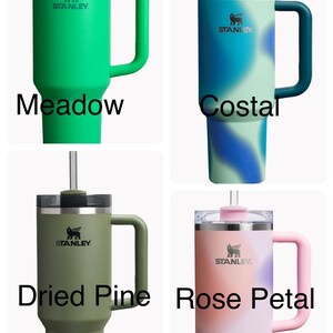May include: Four Stanley brand travel mugs with different color patterns and handles. The colors are Meadow green, Coastal blue, Dried Pine green, and Rose Petal pink.