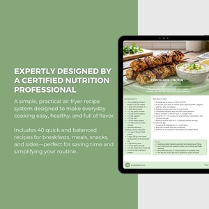May include: A digital tablet displays a recipe for Lemon-Herb Chicken Souvlaki Skewers. The recipe includes ingredients and instructions for air frying. The text on the screen is in English. The tablet is on a green background.