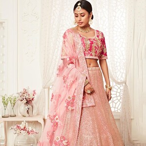 Wonderous Pink Bridal Wear Heavy Embroidered Silk Lehenga Choli
