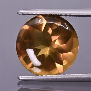 Honey quartz faceted round fi 12 mm