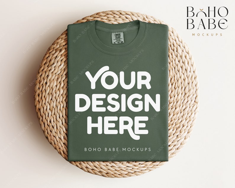 May include: A green t-shirt mockup with the text "YOUR DESIGN HERE" on a woven wicker surface. The text "BOHO BABE MOCKUPS" is printed on the bottom of the shirt.