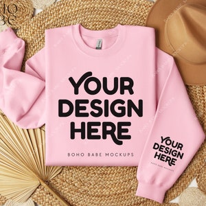 May include: A pink sweatshirt mockup with the text "Your Design Here" and "BOHO BABE MOCKUPS" on a natural woven background with a straw hat and a fan.