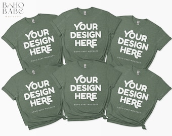 May include: Six green t-shirts with the text "YOUR DESIGN HERE" printed in white on each shirt. The shirts are arranged in a pile, with the text facing the viewer.