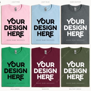 May include: Six different color t-shirts with the text "Your Design Here" and "boho babe mockups" printed on them. The colors are light pink, light blue, dark heather, irish green, maroon, and military green.