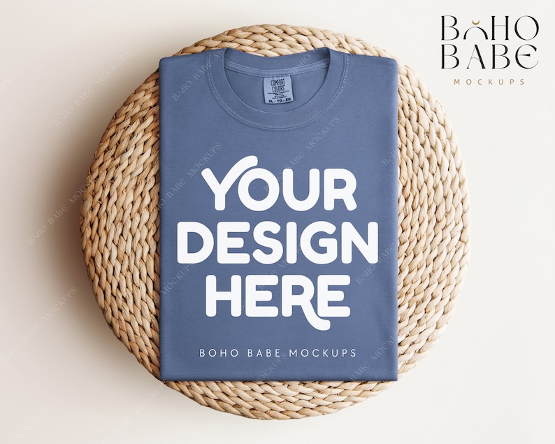 May include: A blue t-shirt mockup with the text "YOUR DESIGN HERE" on a woven straw mat. The text "BOHO BABE MOCKUPS" is also visible on the shirt.