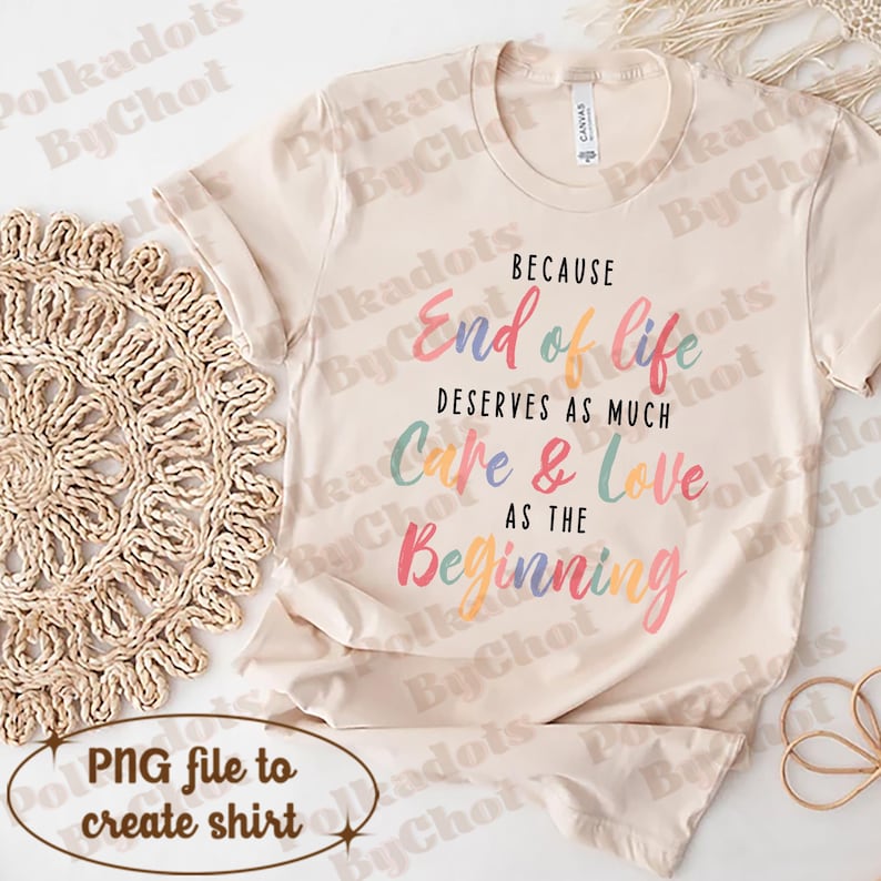 May include: A beige t-shirt with the text "Because end of life deserves as much care & love as the beginning" printed in rainbow colors.