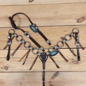 Ring Headstall tack set engraved with Thunderbird Conchoes and antique hardware with Argentina Leather fringe with turquoise studs (Ring)
