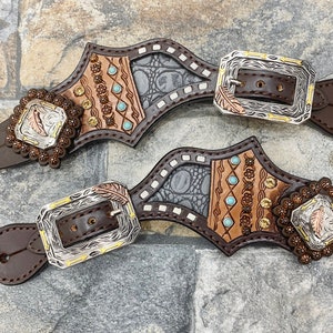 Spurs Leather Ladies Spur strap decorated with alligator and engraved look leather with turquoise rhinestone and buck stitching inlay
