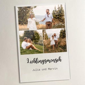 May include: A photo print featuring three images of a couple in outdoor settings. The print has the German word "Lieblingsmensch" and the names "Julia und Marvin" in a script font. The images show the couple holding hands and embracing.