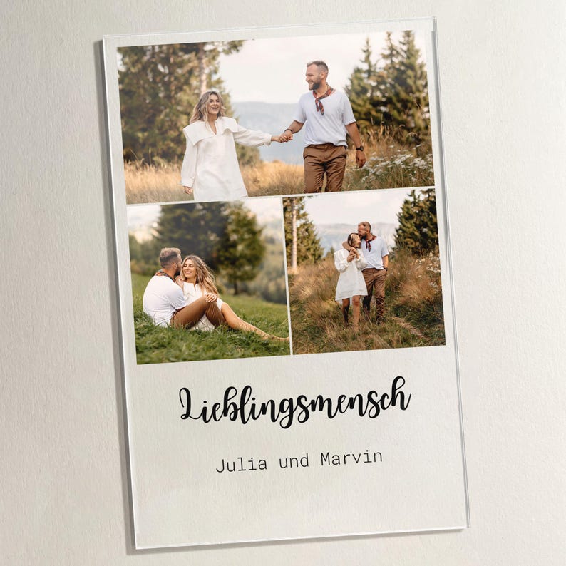 May include: A photo print featuring three images of a couple in outdoor settings. The print has the German word "Lieblingsmensch" and the names "Julia und Marvin" in a script font. The images show the couple holding hands and embracing.