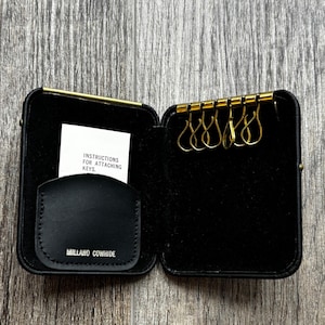 Vintage Millano Cowhide Black Leather 6-Hook Key Case Gold Tone Clamshell Wallet