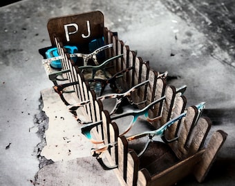 Le présentoir de rangement personnalisé pour décorations de lunettes peut contenir 15 décorations