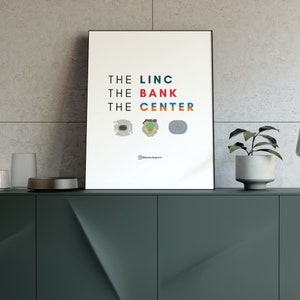 May include: A white poster with the text "THE LINC THE BANK THE CENTER" in colourful letters. Three stadium outlines are shown below the text.