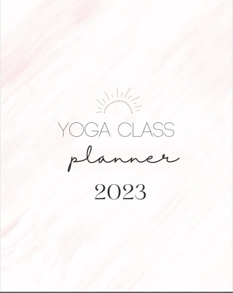 May include: A white background with a subtle pink watercolor design. The text "YOGA CLASS planner 2023" is centered on the page. A stylized sun graphic is above the text.