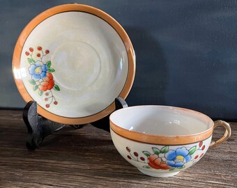Vintage Japanese cup & saucer with floral design