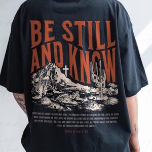 Seien Sie still und kennen Sie christliches Hemd Bibel-Vers-T-Shirt Glaube basierte Kleidung Anbetung-Evangelium-T-Stück christliches Geschenk Taufe-religiöses Kleidungs-Hemden