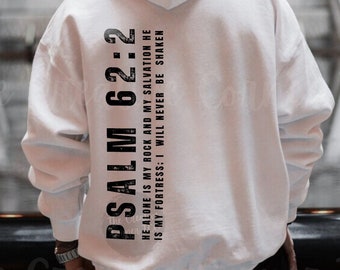 May include: White hooded sweatshirt with the text "PSALM 62:2 HE ALONE IS MY ROCK AND MY SALVATION HE IS MY FORTRESS: I WILL NEVER BE SHAKEN" printed on the back.