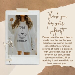 May include: Cream-colored sweatshirt with the text "WHERE THE SPIRIT OF THE LORD IS THERE IS FREEDOM" in black. The design includes a bird and floral elements. The image is presented in a polaroid-style frame.