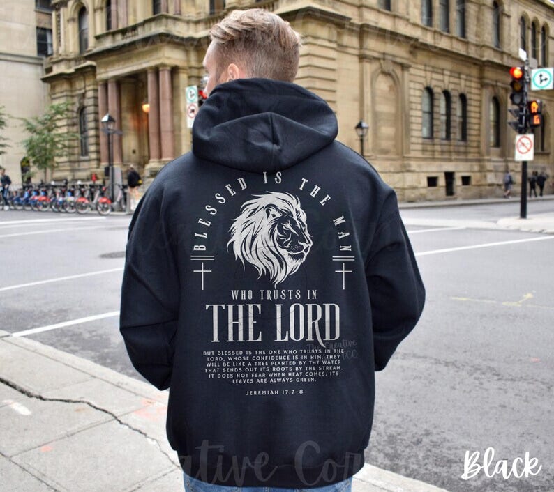 May include: Black hoodie with a white graphic print of a lion and the text "Blessed is the man who trusts in the Lord". The text includes a bible verse from Jeremiah 17:7-8.