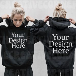 Puede incluir: Sudadera con capucha negra con el texto "Your Design Here" en la parte delantera y trasera.