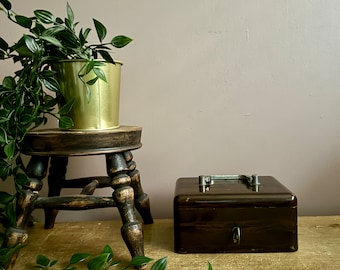 A really unusual brown and sturdy vintage metal cash box, with working lock and key