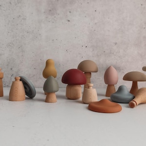 Montessori mushroom mix and match toy made from wood and silicone for toddler play