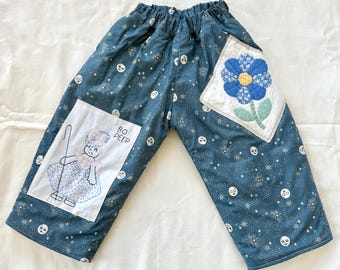Winter Quilt Kids Pants: Handmade Baggy Fit, Good Spirit print lined with padded fabric and vintage embroidery patch.