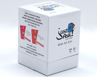 May include: A white box with a red and blue design. The box contains a card game called "Just Ask!" with the tagline "Ready. Set. Play." The box also states that the game is for ages 16+.