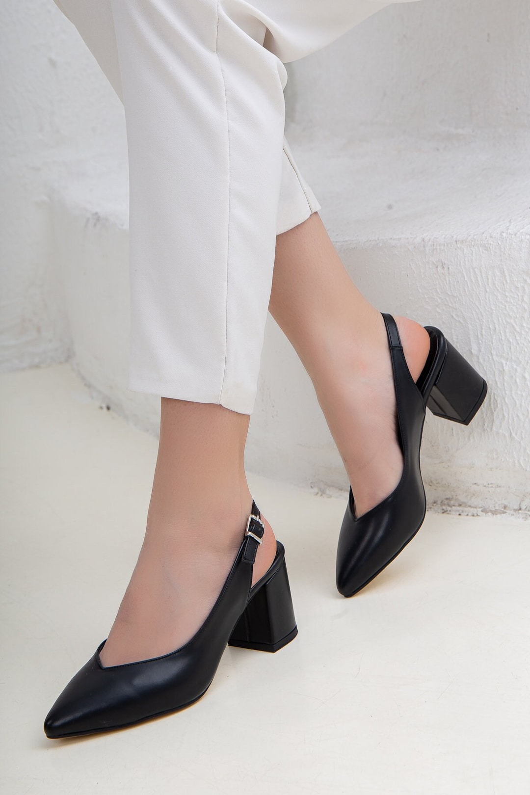 snakeskin closed toe heels