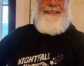 Felpa con cappuccio fosforescente che celebra i cieli notturni del Colorado.