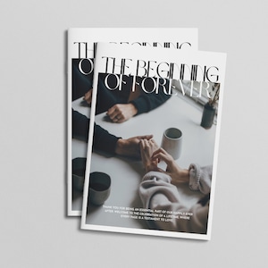 May include: A wedding photo album with the title "The Beginning of Forever" on the cover. The cover features a photo of a couple holding hands at a table with a cup of coffee.