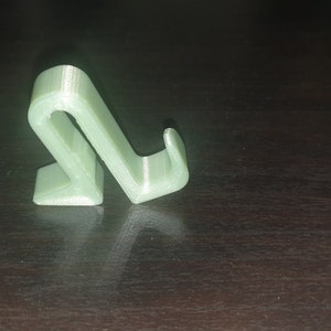 Poop Peg (vous permet de garder vos mains libres et propres pendant que vous attendez qu’une poubelle pour chien apparaisse)