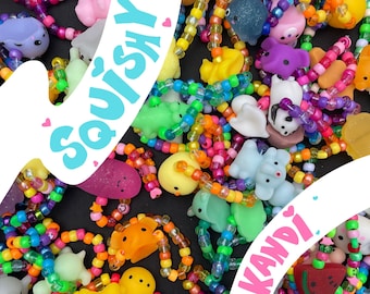 May include: A colorful assortment of squishy toys and colorful beaded bracelets. The toys are shaped like animals, food, and other fun objects. The bracelets are made with small, colorful beads. The image includes the words "Squishy" and "Kandy".
