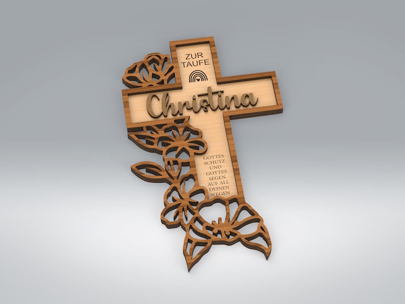 May include: Wooden cross with the name "Christina" and floral cutouts. The cross has text that reads "ZUR TAUFE" and "GOTTES SCHUTZ UND GOTTES SEGEN AUF ALL DEINEN WEGEN". The cross is made of light brown wood with darker brown accents.
