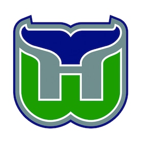 May include: A green and blue logo featuring a stylised letter "W" and a whale tail.