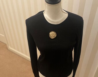 Vintage Chanel Black Long sleeve top with gold flower emblem on chest and sleeves