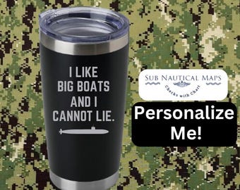 May include: Black stainless steel tumbler with the text "I LIKE BIG BOATS AND I CANNOT LIE" and a submarine graphic. The tumbler also has the text "Personalize Me!" and "SUB NAUTICAL MAPS Checks with Chart".